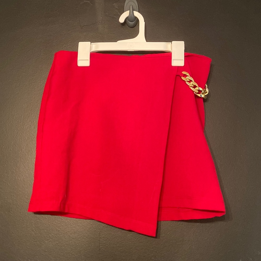 Red skirt with gold chain